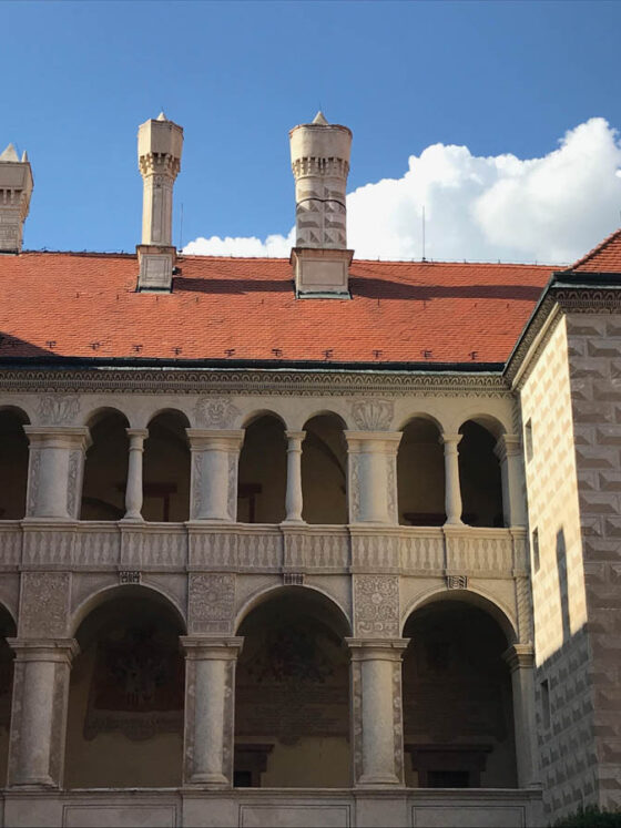 Exterior building with tiled rooftop of the Chateau