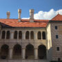 Exterior building with tiled rooftop of the Chateau